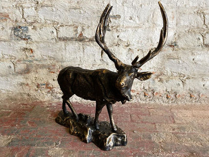 stag on metal base